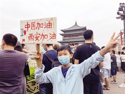 激情闪耀古城 传递全运盛情十四运会和残特奥会火炬传递侧记