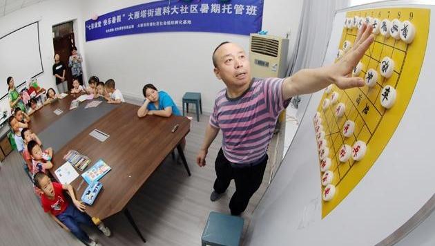 【图集】七彩课堂快乐暑假②  小小棋手与老师捉对厮杀