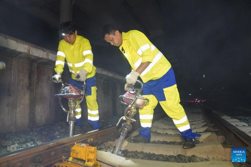 Feature: From protecting homelands to safeguarding railway -- Retired veterans, apprentices on China-Laos Railway